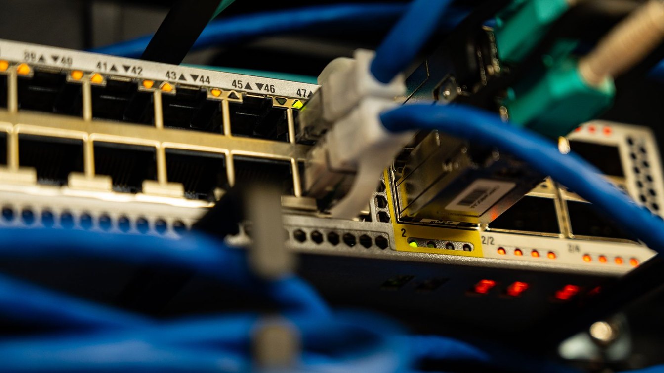 A network switch with dense cabling in a server rack